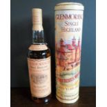 A bottle of Glenmorangie Single Highland Malt Scotch Whisky, aged 10 years, in original metal tube,