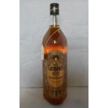 A bottle of Grant's US proof, Superior Strength Scotch Whisky, 1L, 50% proof.