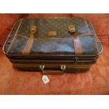 A late 20th century Louis Vuitton expanding suitcase (33cm x 51cm).