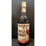 A bottle of Austin Nichols Wild Turkey Kentucky Straight Bourbon Whiskey, bottled in the 1980's,