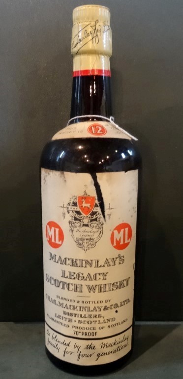 A bottle of Mackinlay's Legacy Scotch Whisky, aged 12 years, bottled in the 1960's, 70% proof.