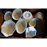 A collection of ten 19th century and later ceramic jelly moulds,