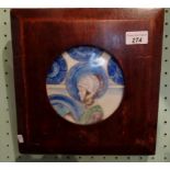 A late 19th century porcelain circular tile,