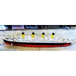 A large scale model of the Titanic, probably kit form, good quality details throughout (108cm).