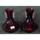 A pair of contemporary amethyst coloured vases (25cm).