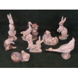 Eight Lladro and Nao animal figurines, to include: rabbits, geese, polar bears and others.