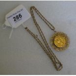 A Queen Victoria sovereign, 1889, in a yellow metal pendant mount and chain.