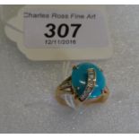 A turquoise and diamond dress ring,