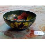 A Moorcroft Hibiscus pattern small pedestal bowl,