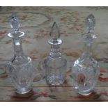 A pair of crystal glass tall decanters (35cm),