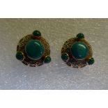 A pair of 9 carat gold and four stone turquoise earrings,