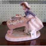 A Lladro figurine, no. 5460, 'A Barrow of Fun' (20cm).