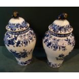 A pair of 20th century Copeland baluster jars and covers, having Dog of Fo finials,