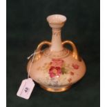 A Royal Worcester blush ivory twin handled vase of conical baluster form,