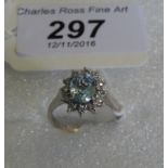 An aquamarine and diamond cluster ring,