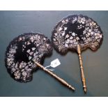 A pair of papier mache and mother of pearl inlaid fans, each with gilt handle (39cm).
