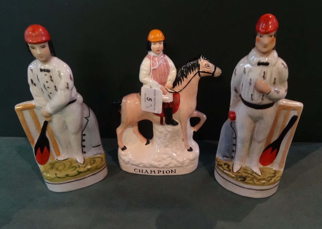 A pair of Staffordshire flatback cricketer figurines,