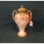 A late Victorian Royal Worcester twin handled blush ivory covered vase,