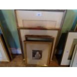 Nineteenth century British School, a seated young girl holding a picture frame, oil (12cm x 9.