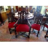 A set of ten 20th century carved oak dining chairs (8 standard and 2 carvers).