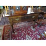 A 19th century oak single drawer side table (110cm x 53cm).