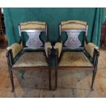 A pair of Edwardian mahogany and inlaid salon armchairs (55cm wide).