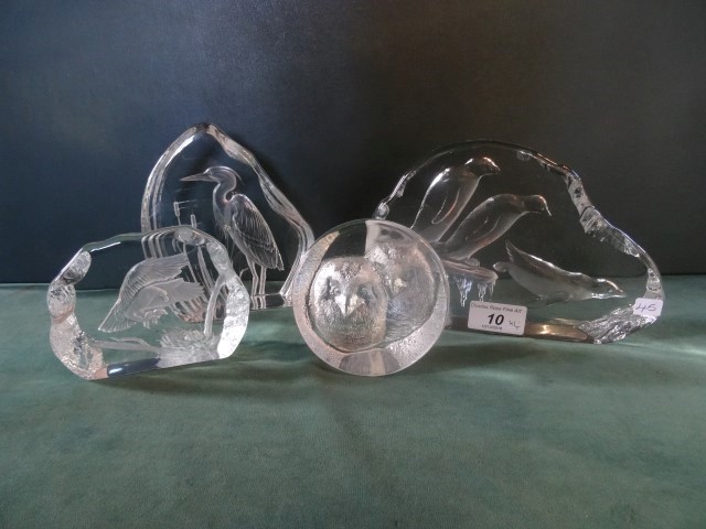 A collection of four Scandinavian crystal glass sculptures,