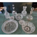 Four cut glass decanters, together with five other items of cut glass.