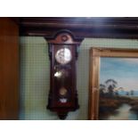 A late 19th century mahogany Vienna wall clock (80cm).