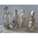 A Lladro collector's series 1991 figurine (7611), together with three further Lladro figurines.