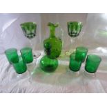 A collection of 19th century and later green coloured glass, to include: a small decanter,