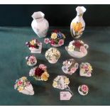 A collection of Aynsley and Royal Doulton porcelain ornamental flower baskets,