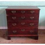 A Victorian oak four drawer chest on bracket feet (76cm wide).