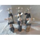 A group of six Lladro figurines, each of nuns (the tallest 26cm).