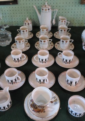 A set of six Susie Cooper Corinthian pattern coffee cups and saucers,