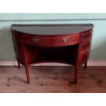 An Edwardian mahogany demi-lune dressing table (104cm).