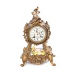 French gilt-metal and porcelain mantel clock, Marti & Cie late 19th century, striking movement,