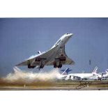 Concorde: 8x12 inch photo signed by early French Concorde test  Pilot, Gilbert Defer who flew