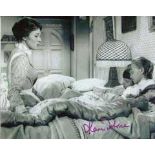 Mary Poppins: 8x10 inch photo from the classic Walt Disney movie "Mary Poppins" hand signed by