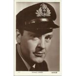 Donald Sinden small sepia postcard.  Unsigned Good condition. All signed items come with