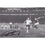 World Cup 1966 - Sir Geoff Hurst. 7x5 picture of Hurst scoring his third goal in the World Cup Final