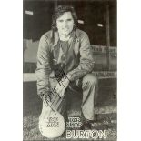 George Best signed 6 x 4 inch black and white Burton Top Man Top Shop promo card in football kit.