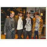 Colour 8x12 photograph signed by all four members of top indie band Blur. Good condition. All