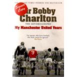 Bobby Charlton autographed book. Paperback edition of Sir Bobby Charlton - My Manchester United