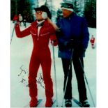 Lynn Holly Johnson signed James Bond 10x8 colour photo, ski scene with Roger Moore.  Good condition.