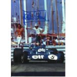 Jackie Stewart signed photo along with other photos Good condition. All signed items come with