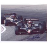 Mario Andretti. 10x8 picture racing in F1 car. Excellent.Good condition. All signed items come