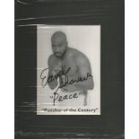 Earnie Shavers  Puncher of the Century  signed small b/w photo mounted.  is an American former