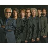 Foreigner siged 10x8 colour photo.  Signed by 4 membersGood condition. All signed items come with
