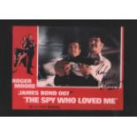 Roger Moore and Richard Kiel signed James Bond display. 11 x 13 inch colour reproduction of a poster
